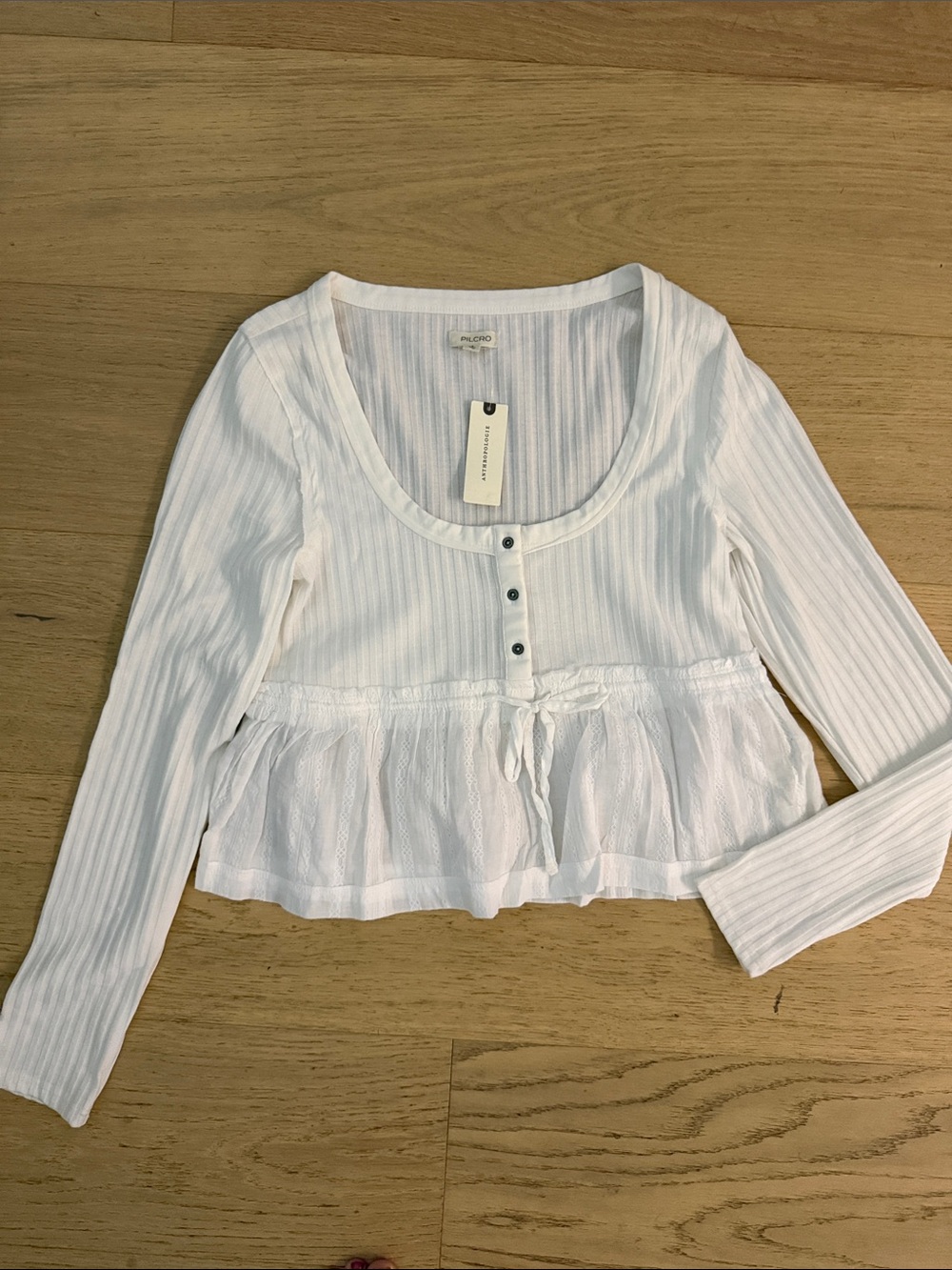 White Cropped Ribbed Henley Peplum Top - pilcro
